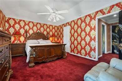 This gated estate offers a lavish, resort-style atmosphere where on Heron Lakes Country Club in Alabama - for sale on GolfHomes.com, golf home, golf lot