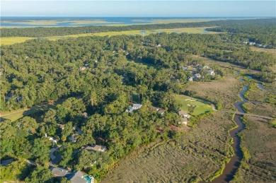 Tucked at the end of a quiet cul-de-sac in the gated coastal on The King and Prince Golf Course, Home of the Hampton Club in Georgia - for sale on GolfHomes.com, golf home, golf lot