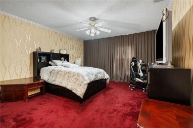 This gated estate offers a lavish, resort-style atmosphere where on Heron Lakes Country Club in Alabama - for sale on GolfHomes.com, golf home, golf lot