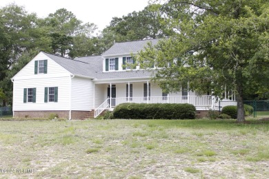 This stunning 4 bedroom, 2.5 bath home boasts a walk around on Majestic Pines Golf and Country Club in North Carolina - for sale on GolfHomes.com, golf home, golf lot