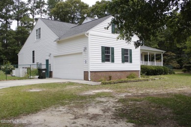 This stunning 4 bedroom, 2.5 bath home boasts a walk around on Majestic Pines Golf and Country Club in North Carolina - for sale on GolfHomes.com, golf home, golf lot