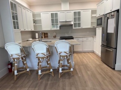Located in Wellington's prestiges Palm Beach Polo & Country Club on Palm Beach Polo and Country Club in Florida - for sale on GolfHomes.com, golf home, golf lot