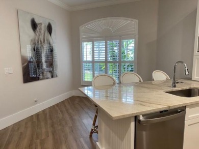 Located in Wellington's prestiges Palm Beach Polo & Country Club on Palm Beach Polo and Country Club in Florida - for sale on GolfHomes.com, golf home, golf lot