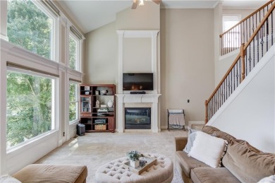 Welcome to this stunning 6 bedroom, 4 bath lakefront home in on Hamilton Mill Golf Club in Georgia - for sale on GolfHomes.com, golf home, golf lot