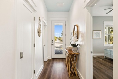 Welcome to 147 Charlotte Avenue, a next to new coastal retreat on Seascape Golf Course in Florida - for sale on GolfHomes.com, golf home, golf lot