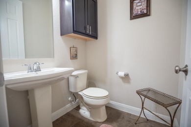Tucked at the end of a quiet cul-de-sac, this thoughtfully on Apple Rock Golf Course - Horseshoe Bay in Texas - for sale on GolfHomes.com, golf home, golf lot