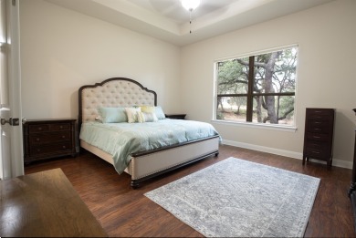Tucked at the end of a quiet cul-de-sac, this thoughtfully on Apple Rock Golf Course - Horseshoe Bay in Texas - for sale on GolfHomes.com, golf home, golf lot