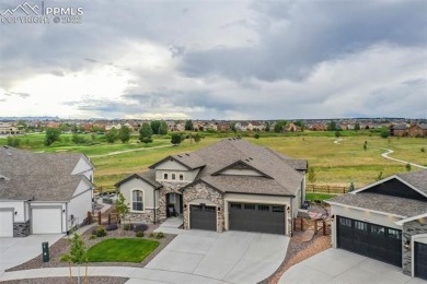 This home has it all! The stucco and stacked stone give this on Antler Creek Golf Course in Colorado - for sale on GolfHomes.com, golf home, golf lot