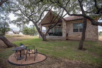 Tucked at the end of a quiet cul-de-sac, this thoughtfully on Apple Rock Golf Course - Horseshoe Bay in Texas - for sale on GolfHomes.com, golf home, golf lot