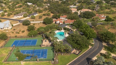 Tucked at the end of a quiet cul-de-sac, this thoughtfully on Apple Rock Golf Course - Horseshoe Bay in Texas - for sale on GolfHomes.com, golf home, golf lot