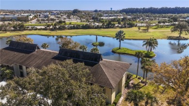 Charming 1st fl condo boasting stunning lake & golf course on Vista Plantation Golf Club in Florida - for sale on GolfHomes.com, golf home, golf lot