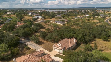 Tucked at the end of a quiet cul-de-sac, this thoughtfully on Apple Rock Golf Course - Horseshoe Bay in Texas - for sale on GolfHomes.com, golf home, golf lot