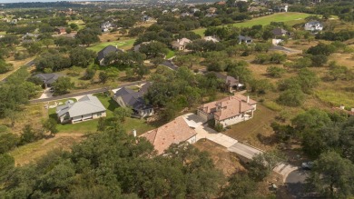 Tucked at the end of a quiet cul-de-sac, this thoughtfully on Apple Rock Golf Course - Horseshoe Bay in Texas - for sale on GolfHomes.com, golf home, golf lot