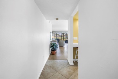 Welcome to your dream retreat in this stunning two-bedroom on IMG Academies Golf and Country Club in Florida - for sale on GolfHomes.com, golf home, golf lot