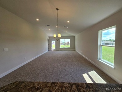 This 2020 sq. ft. home on a cul-de-sac has a partial view of the on Twisted Oaks Golf Club in Florida - for sale on GolfHomes.com, golf home, golf lot