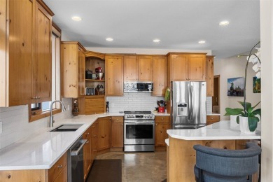 This exceptional level-entry, three-story chalet, nestled along on Sun Peaks Resort Golf Course in  - for sale on GolfHomes.com, golf home, golf lot
