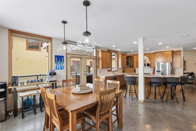 This exceptional level-entry, three-story chalet, nestled along on Sun Peaks Resort Golf Course in  - for sale on GolfHomes.com, golf home, golf lot
