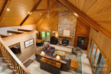 Secluded mountain cabin on three lots totaling 2.74 acres with on Wolf Laurel Country Club in North Carolina - for sale on GolfHomes.com, golf home, golf lot
