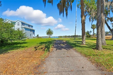 Come build the house of your dreams with the most amazing view on Plantation Inn and Golf Resort  in Florida - for sale on GolfHomes.com, golf home, golf lot