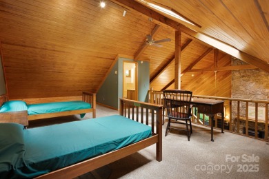 Secluded mountain cabin on three lots totaling 2.74 acres with on Wolf Laurel Country Club in North Carolina - for sale on GolfHomes.com, golf home, golf lot