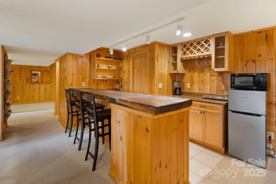 Secluded mountain cabin on three lots totaling 2.74 acres with on Wolf Laurel Country Club in North Carolina - for sale on GolfHomes.com, golf home, golf lot