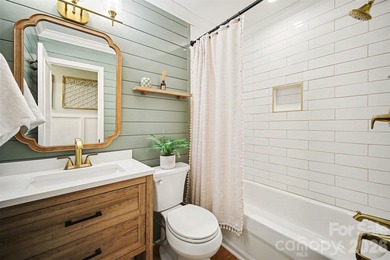 This 1.5-story traditional home is located in the highly on Tega Cay Golf Club in South Carolina - for sale on GolfHomes.com, golf home, golf lot