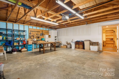 Secluded mountain cabin on three lots totaling 2.74 acres with on Wolf Laurel Country Club in North Carolina - for sale on GolfHomes.com, golf home, golf lot