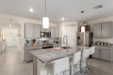 A fresh sense of calm rises from this single story residence on Lake Diamond Golf and Country Club in Florida - for sale on GolfHomes.com, golf home, golf lot