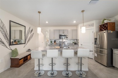 A fresh sense of calm rises from this single story residence on Lake Diamond Golf and Country Club in Florida - for sale on GolfHomes.com, golf home, golf lot