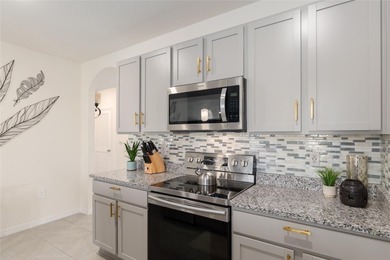 A fresh sense of calm rises from this single story residence on Lake Diamond Golf and Country Club in Florida - for sale on GolfHomes.com, golf home, golf lot