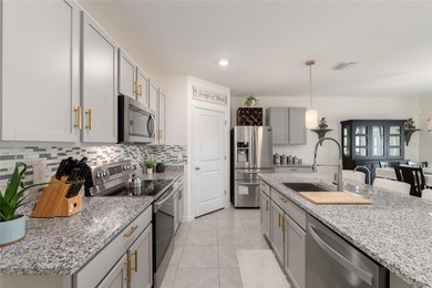 A fresh sense of calm rises from this single story residence on Lake Diamond Golf and Country Club in Florida - for sale on GolfHomes.com, golf home, golf lot