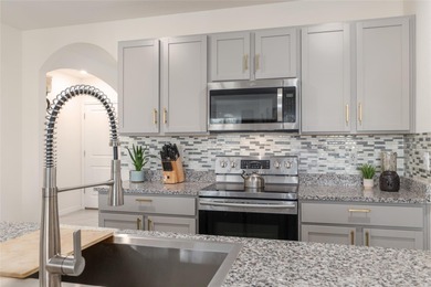 A fresh sense of calm rises from this single story residence on Lake Diamond Golf and Country Club in Florida - for sale on GolfHomes.com, golf home, golf lot