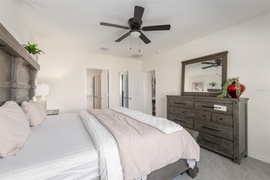 A fresh sense of calm rises from this single story residence on Lake Diamond Golf and Country Club in Florida - for sale on GolfHomes.com, golf home, golf lot