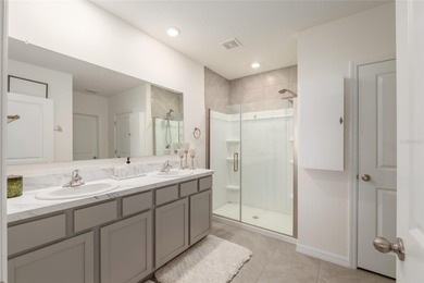 A fresh sense of calm rises from this single story residence on Lake Diamond Golf and Country Club in Florida - for sale on GolfHomes.com, golf home, golf lot