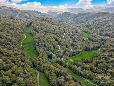 Secluded mountain cabin on three lots totaling 2.74 acres with on Wolf Laurel Country Club in North Carolina - for sale on GolfHomes.com, golf home, golf lot