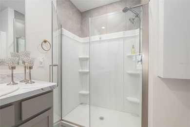 A fresh sense of calm rises from this single story residence on Lake Diamond Golf and Country Club in Florida - for sale on GolfHomes.com, golf home, golf lot