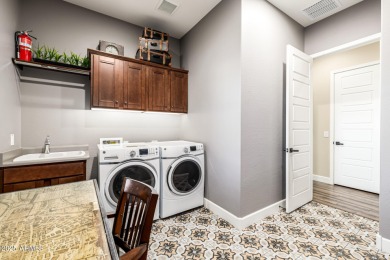 Nestled within an active upscale adult gated community on a on Trilogy Golf Club At Vistancia in Arizona - for sale on GolfHomes.com, golf home, golf lot