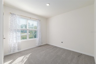 A fresh sense of calm rises from this single story residence on Lake Diamond Golf and Country Club in Florida - for sale on GolfHomes.com, golf home, golf lot