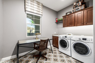 Nestled within an active upscale adult gated community on a on Trilogy Golf Club At Vistancia in Arizona - for sale on GolfHomes.com, golf home, golf lot