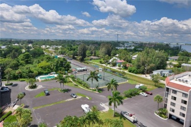 BREATHTAKING WATERFRONT VIEWS, 3 BEDROOMS, 2 BATHS, AND A on Twin Isles Country Club in Florida - for sale on GolfHomes.com, golf home, golf lot