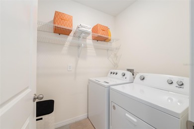 A fresh sense of calm rises from this single story residence on Lake Diamond Golf and Country Club in Florida - for sale on GolfHomes.com, golf home, golf lot