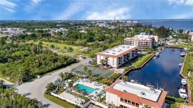 BREATHTAKING WATERFRONT VIEWS, 3 BEDROOMS, 2 BATHS, AND A on Twin Isles Country Club in Florida - for sale on GolfHomes.com, golf home, golf lot