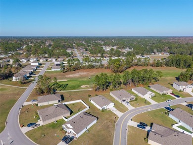 A fresh sense of calm rises from this single story residence on Lake Diamond Golf and Country Club in Florida - for sale on GolfHomes.com, golf home, golf lot