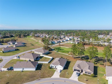 A fresh sense of calm rises from this single story residence on Lake Diamond Golf and Country Club in Florida - for sale on GolfHomes.com, golf home, golf lot