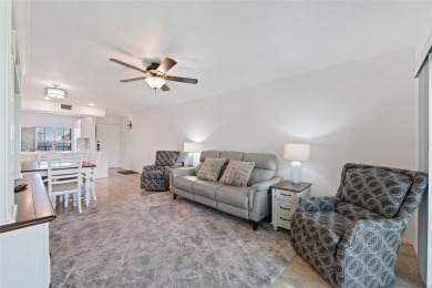 Million dollar golf course and water view for the fraction of on Isla Del Sol Yacht and Country Club in Florida - for sale on GolfHomes.com, golf home, golf lot