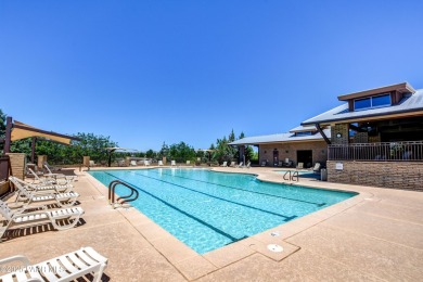 Discover this modern- comfortable home situated on a private on Quail Wood Greens Golf Course in Arizona - for sale on GolfHomes.com, golf home, golf lot