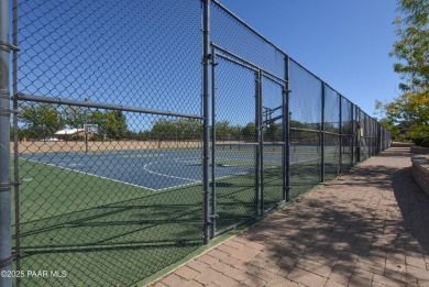Discover this modern- comfortable home situated on a private on Quail Wood Greens Golf Course in Arizona - for sale on GolfHomes.com, golf home, golf lot