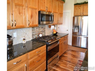 NEW PHOTOS COMING! Beautiful Maintenance Free Patio Home next to on Pelican Lakes Golf and Country Club in Colorado - for sale on GolfHomes.com, golf home, golf lot