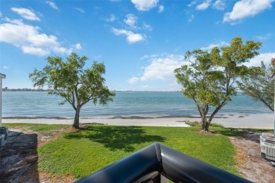 Million dollar golf course and water view for the fraction of on Isla Del Sol Yacht and Country Club in Florida - for sale on GolfHomes.com, golf home, golf lot