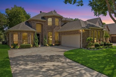 Nestled on a private, gated street overlooking the manicured on Iron Horse Golf Course in Texas - for sale on GolfHomes.com, golf home, golf lot